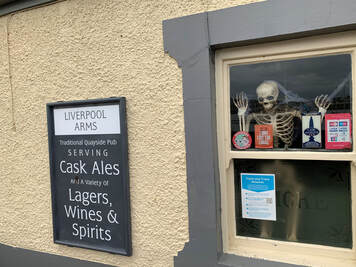 skeleton in pub window